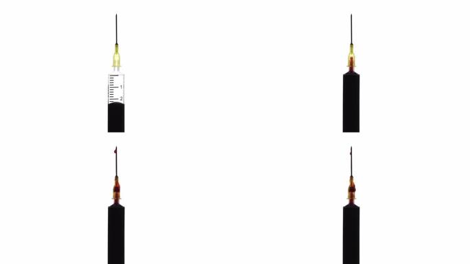 从注射器活塞的针头中泄漏的血液的特写镜头