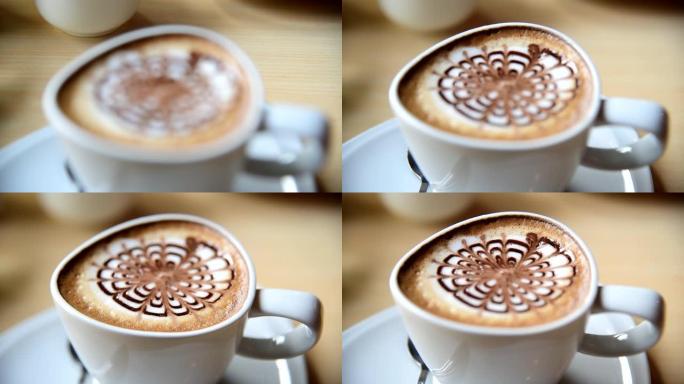 将焦点转向桌上的热咖啡