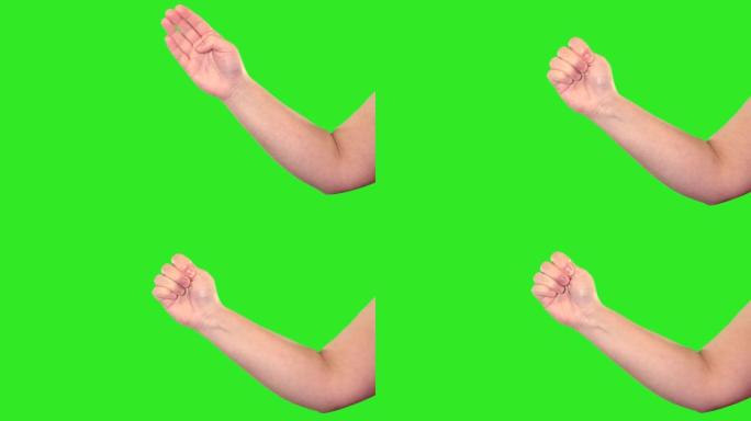 绿色屏幕前女性手的手势。