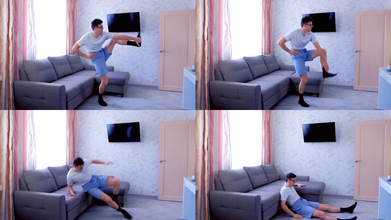有趣的书呆子正在做腿部伸展运动，试图抬起腿，然后在家中摔倒。运动幽默概念。