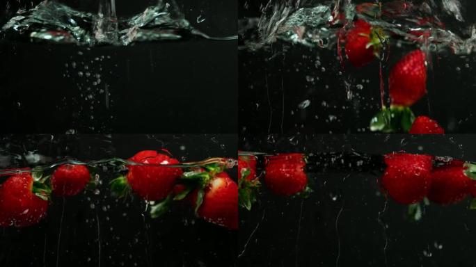 新鲜草莓以慢动作落在水中。在黑色背景上。
