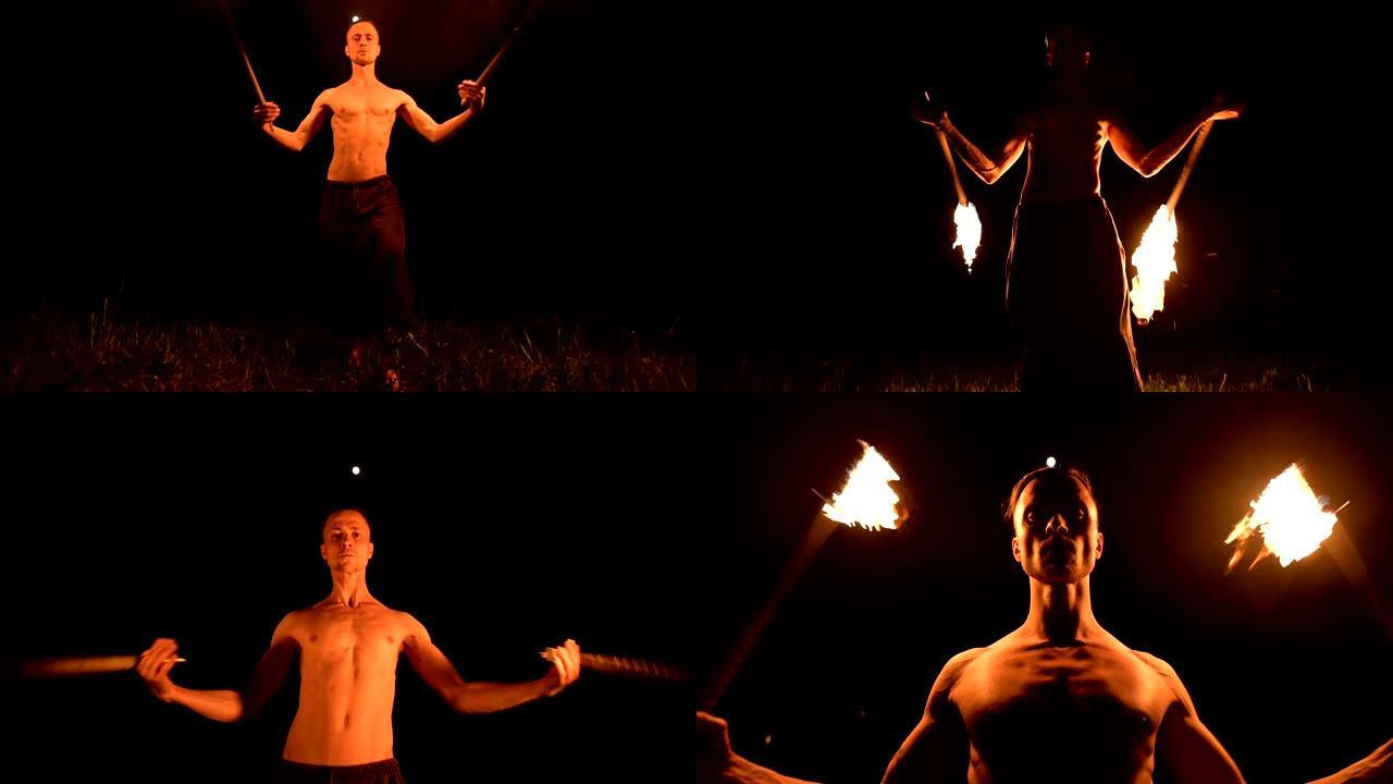 在完全黑暗中，一个年轻人赤裸着上身，穿着黑色裤子的慢动作显示了一个旋转燃烧的火炬的代表。冥想。冷静和