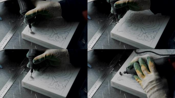 艺术家使用专业工具切割第一层大理石板