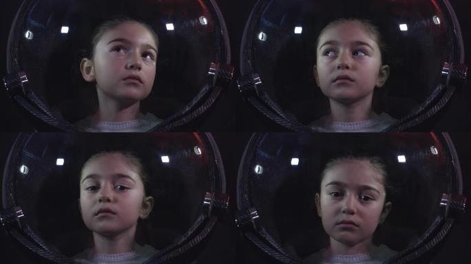近距离拍摄美丽的小女孩宇航员在太空头盔4K