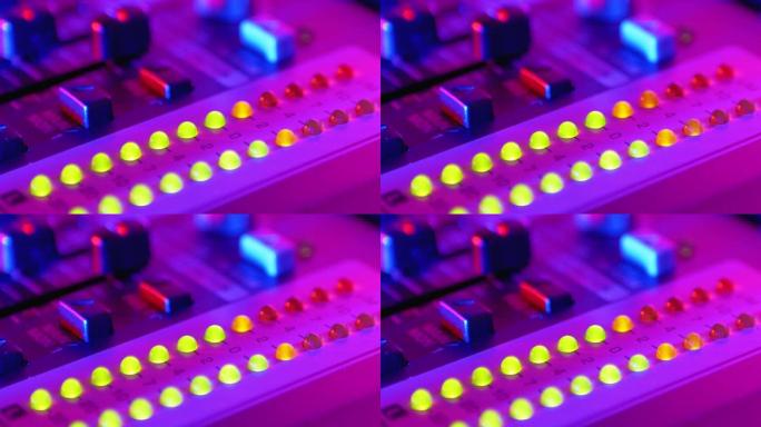 夜总会派对上的混音控制台或Dj控制台上的音量LED指示灯电平信号