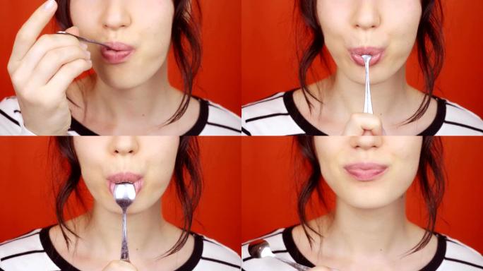 口红化妆的女人吃勺子里的酸奶。