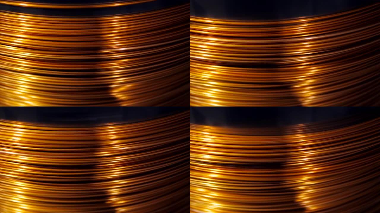 特写线圈的旋转并包裹铜线。电缆制造。