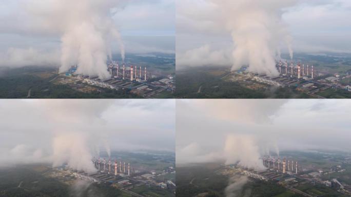 Hyper lapse视频4K，早晨在燃煤电厂Mae Moh Lampang上的蒸汽有雾，空气污染。