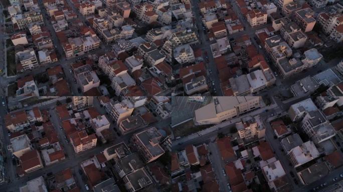 日落时分，希腊首都色雷斯城市科莫蒂尼的鸟瞰图，飞越屋顶