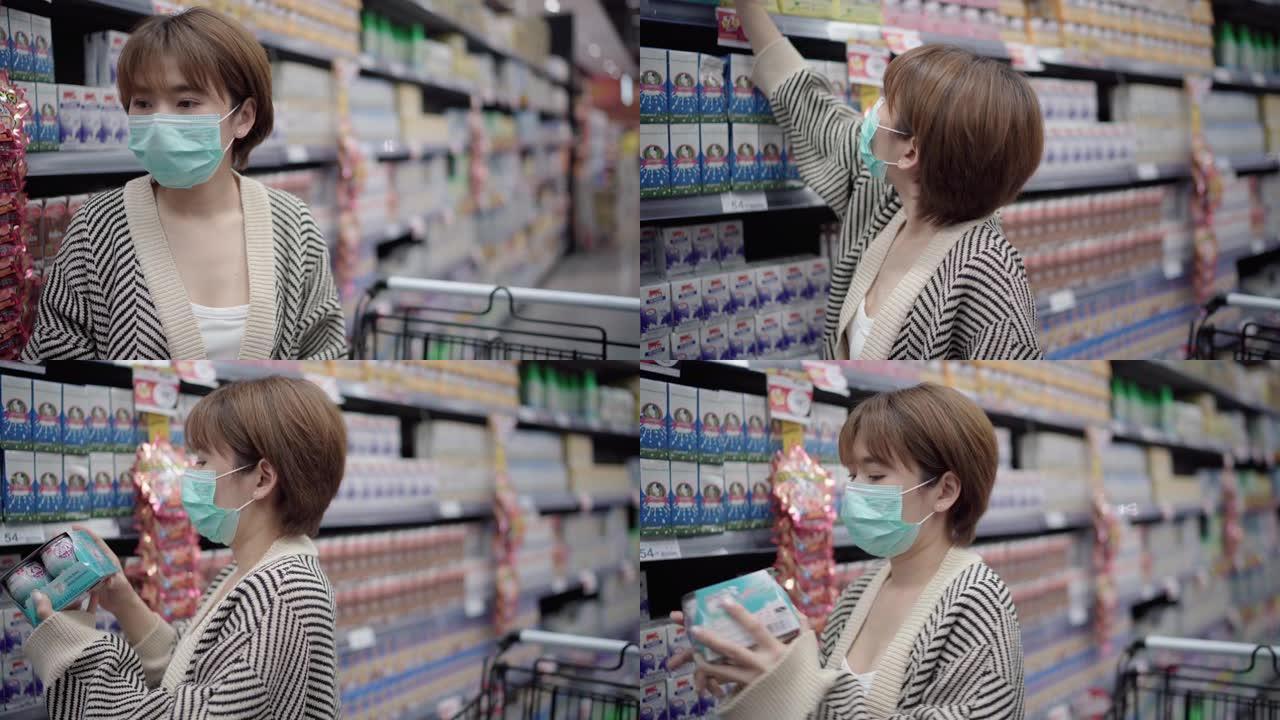 在超市使用污染口罩的亚洲妇女