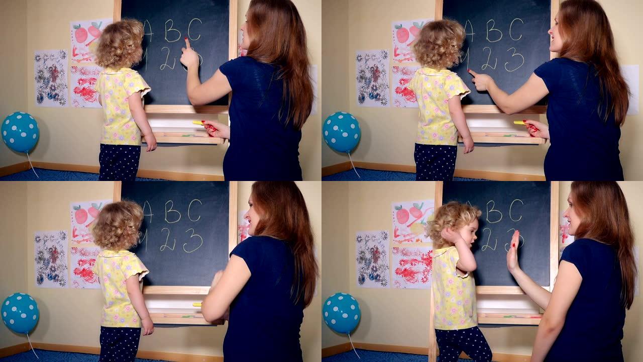 细心的女老师教聪明的女孩字母和数字