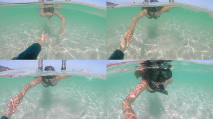 水下情侣浮潜自拍在海里玩得开心
