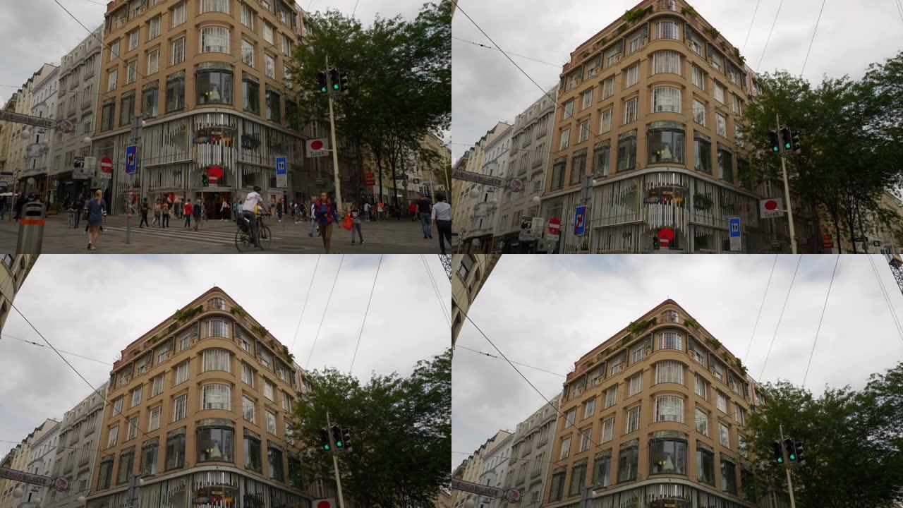 维也纳市中心夏日著名拥挤购物街广场慢动作全景4k奥地利