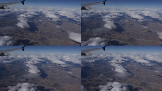 鸟瞰图美国上空的云从飞机窗口4k