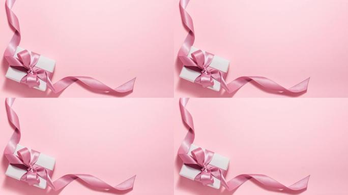 礼品概念。从上面赠送带蝴蝶结的盒子，粉色有复制空间