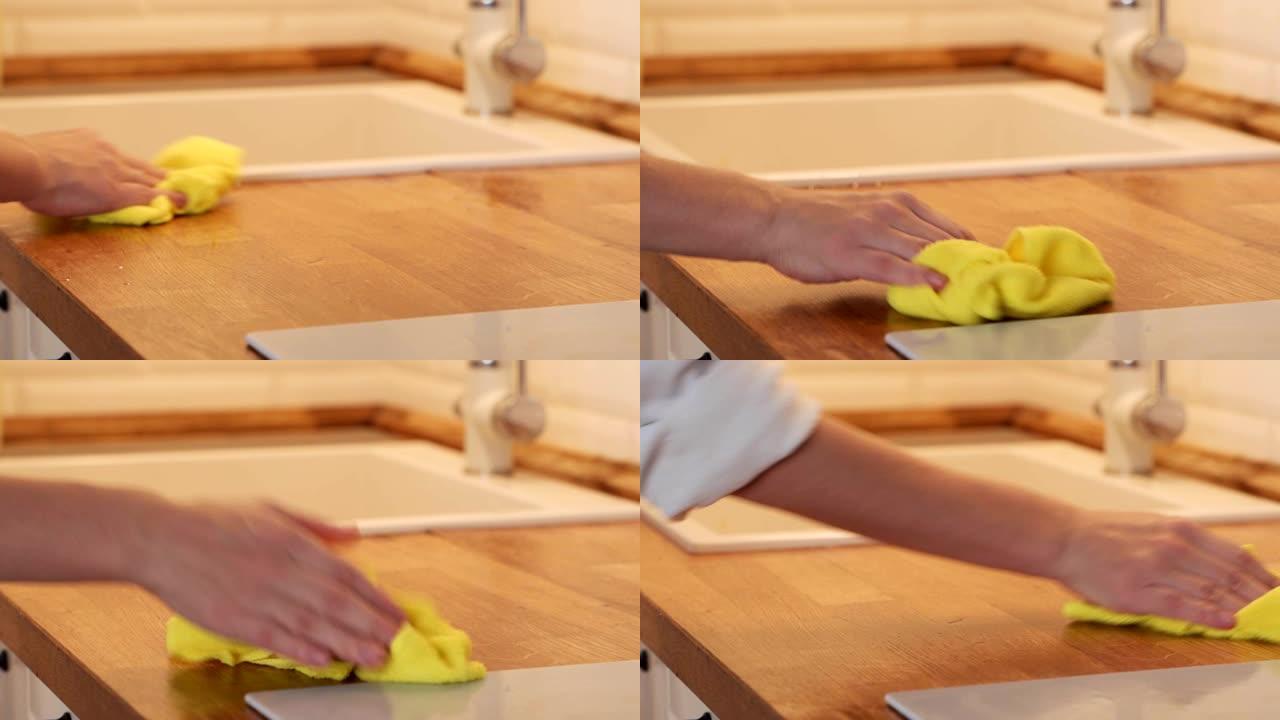 人、家务和家政概念 -- 家庭厨房用抹布特写男性手清洁桌