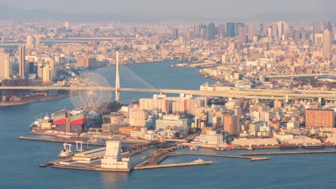大阪的时间流逝; 夜城天际线摩天轮地标，生活之城概念的大阪鸟瞰图