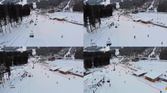 带停车场的滑雪胜地的鸟瞰图。冬季的滑雪场和滑雪缆车
