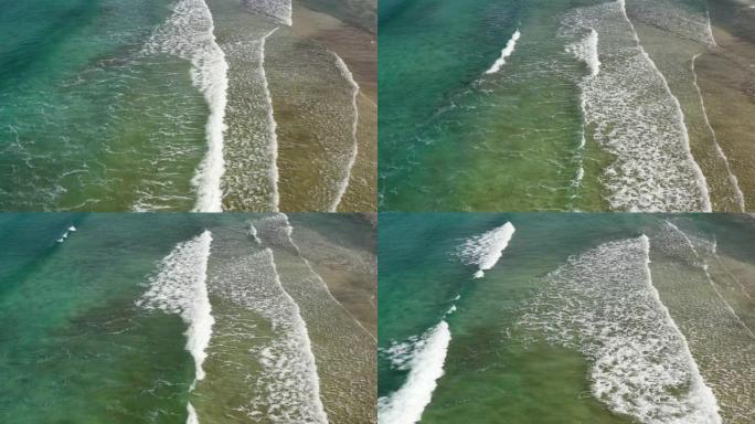 海浪的俯视图浪拍打沙滩沙滩海浪航拍