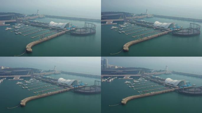 晴天青岛市著名奥林匹克湾码头空中全景4k中国