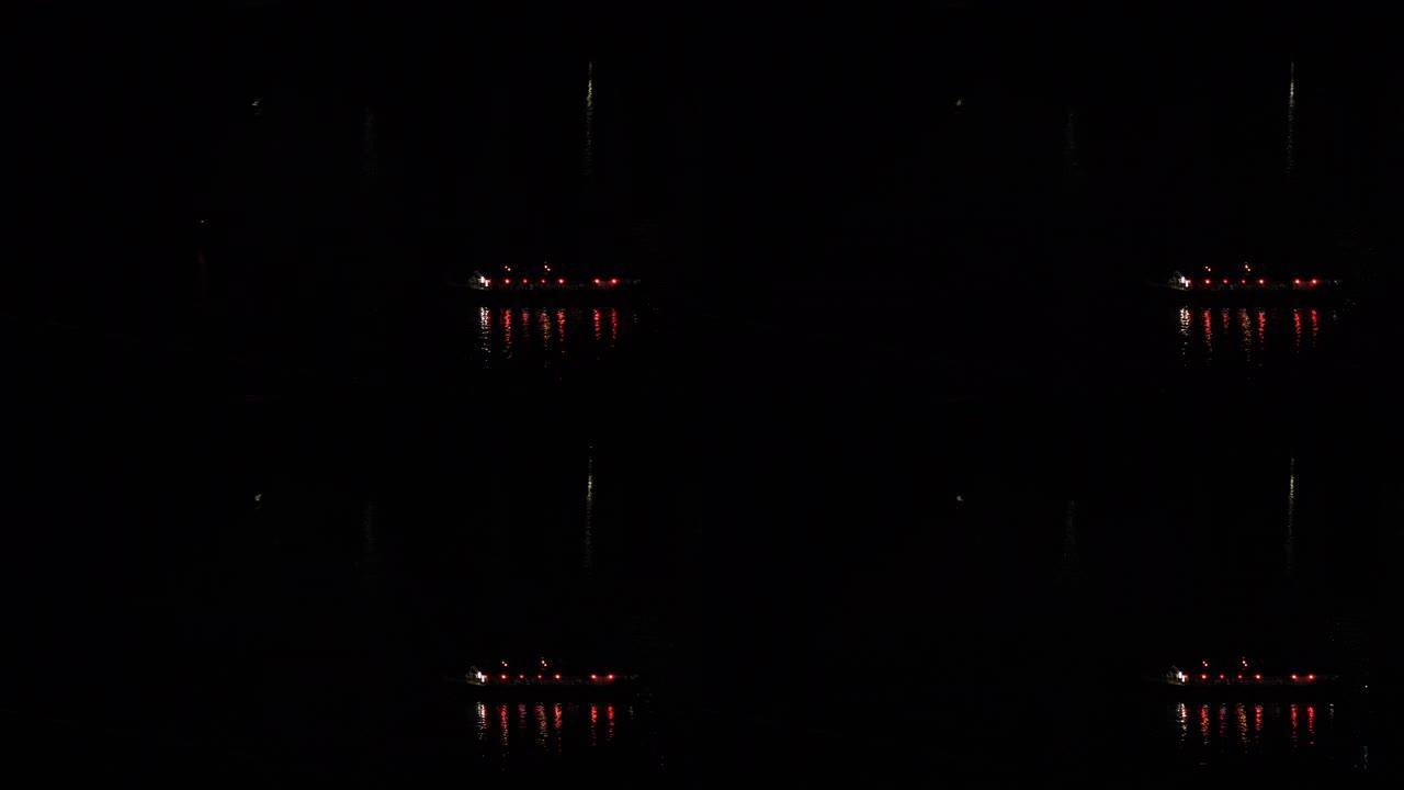 东京市区湾区的一艘夜间船远射
