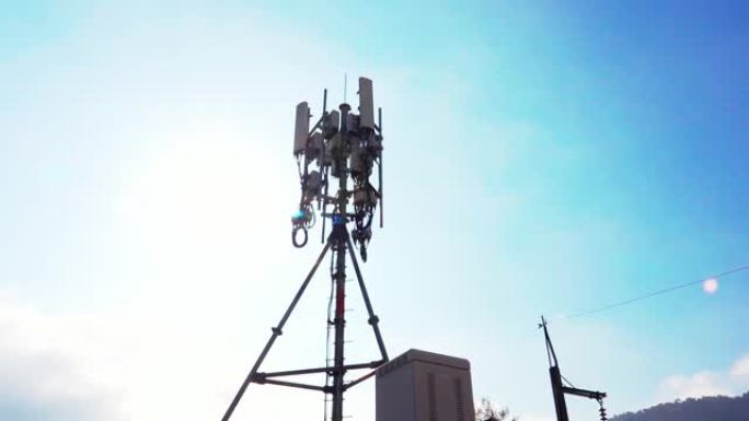 天线塔系统适用于智能手机网络，镜头耀斑效果。