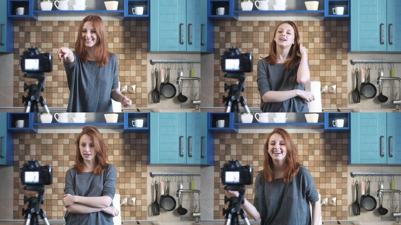 女孩博主在厨房写视频博客。女人拿着视频博客对着镜头说话。