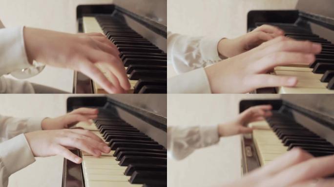 一个年轻女孩手弹钢琴的特写镜头