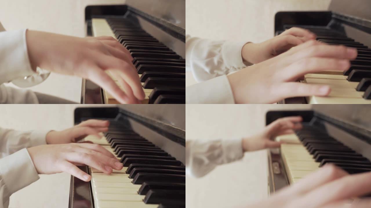 一个年轻女孩手弹钢琴的特写镜头