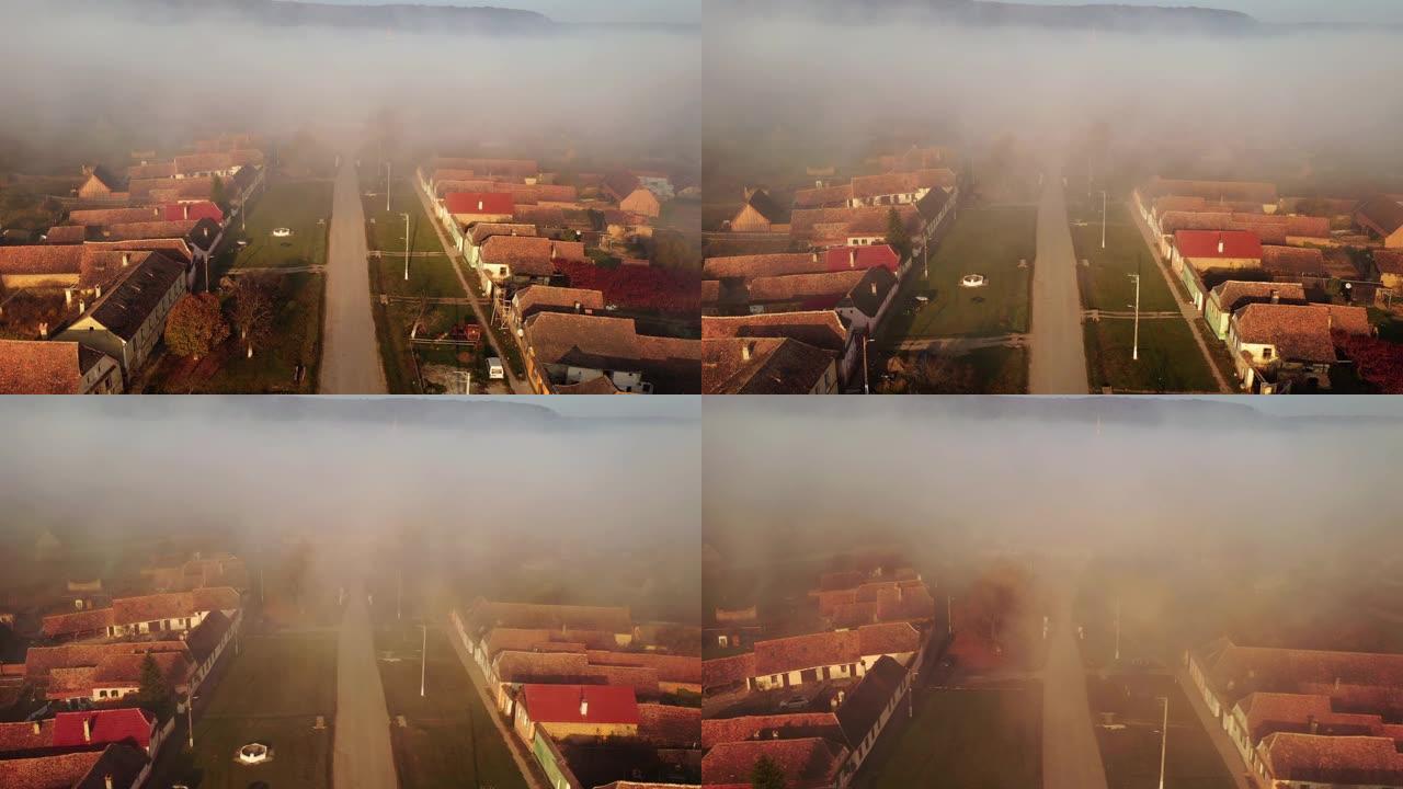 在魔术黄金时段的灯光下拍摄的4k无人机镜头，显示了特兰西瓦尼亚村的街头生活