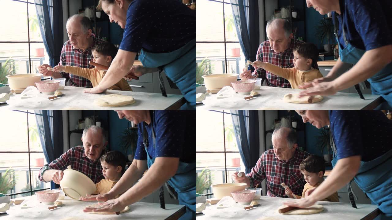 厨房里的祖父母和孙子一起做奶酪羊角面包