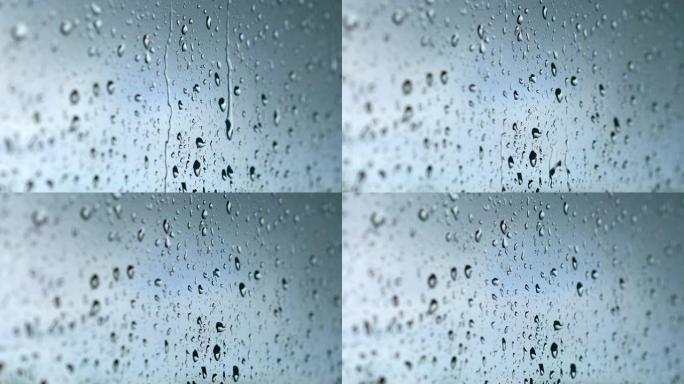 湿玻璃窗覆盖着4k慢动作60fps的水滴