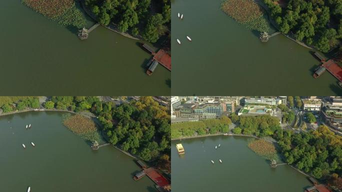 飞越阳光明媚的杭州市著名的湖湾宝塔空中全景4k中国