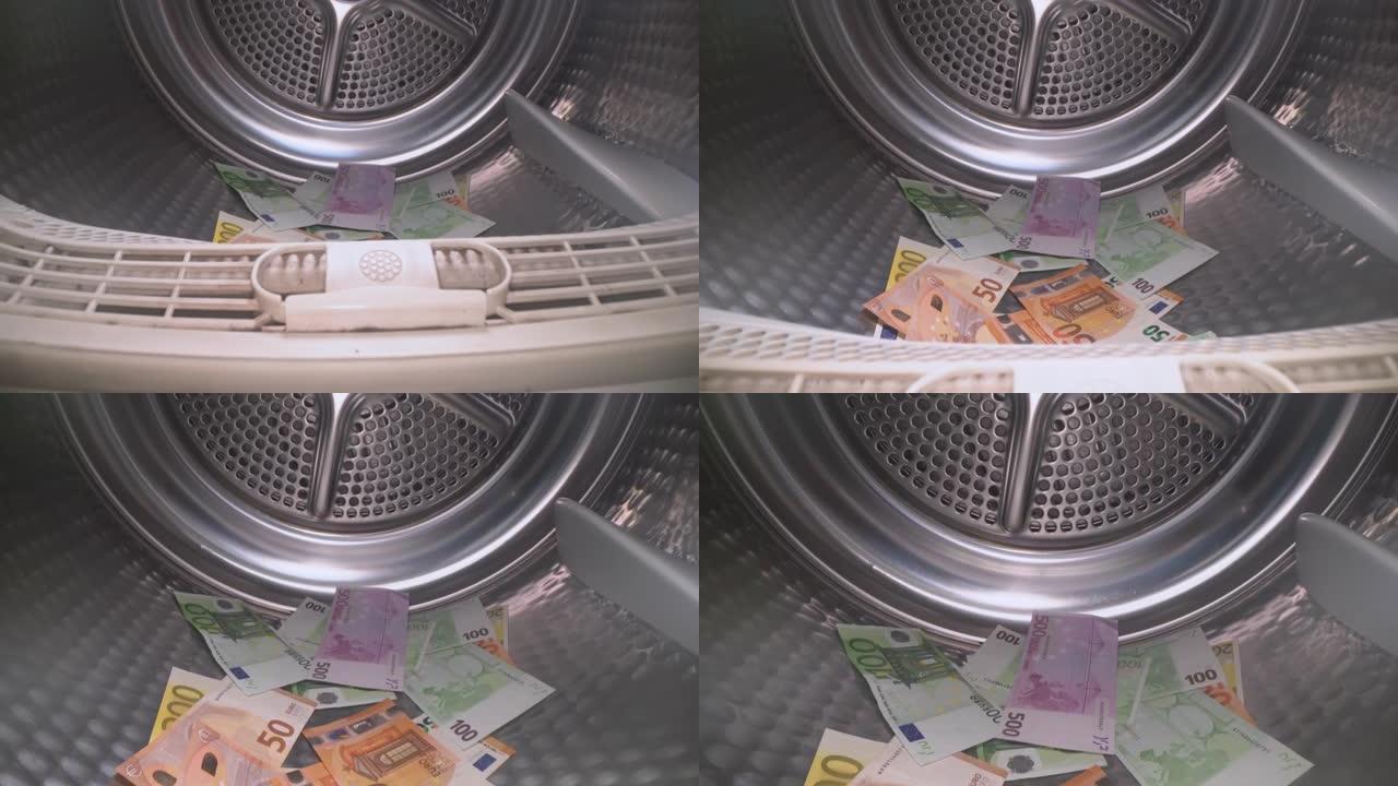 洗钱概念。洗衣机里的钱。多莉拍摄的相机在里面滑动。影子经济，假钞