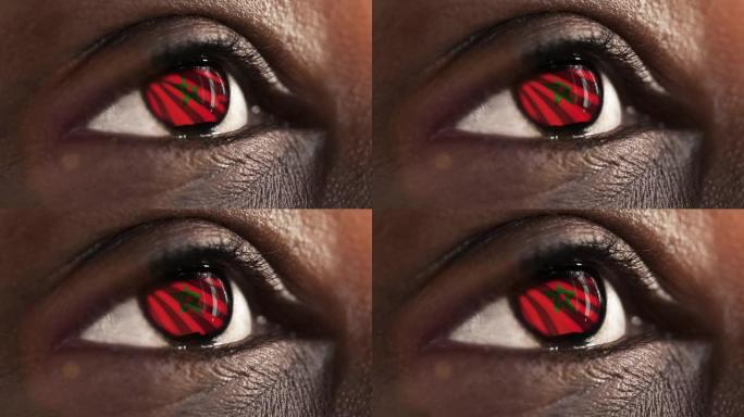 女人黑眼睛在近距离与旗帜摩洛哥鸢尾花与风的运动。视频的概念