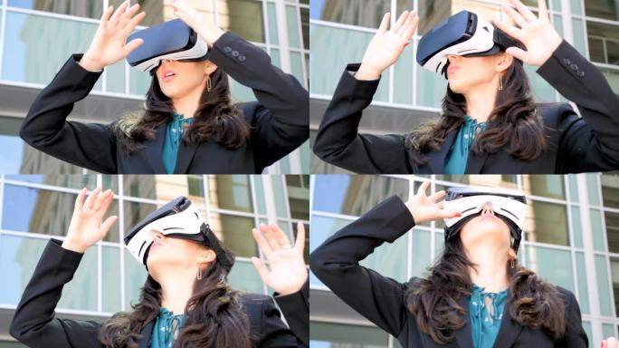 女性企业高管手持VR耳机体验360增强现实