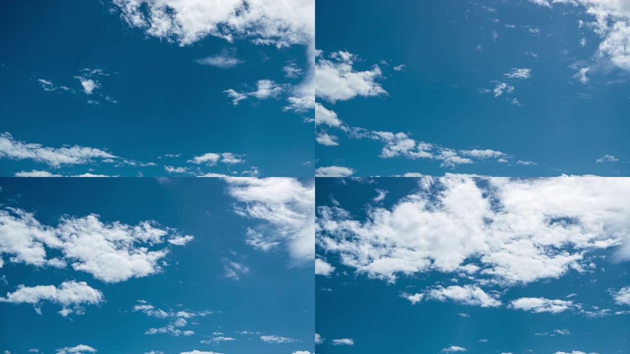 下午白云在蓝天上移动的延时视频。