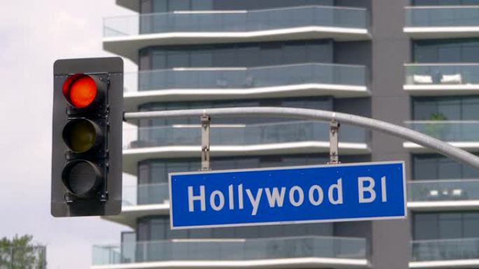 慢动作60fps的4k好莱坞大道街道标志和交通信号灯