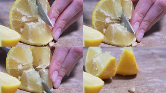 Macro在木板上用大刀切成多汁的柠檬。健康素食，墨西哥文化。有机柑橘特写，静态拍摄4k