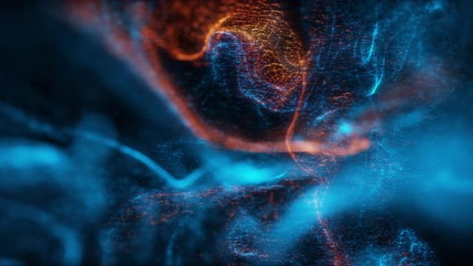 抽象宏观慢动作拍摄蓝色和橙色粒子流体孤立在黑色上。