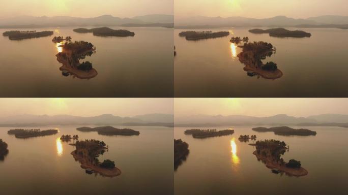 日落时鸟瞰美丽的热带湖泊和小岛