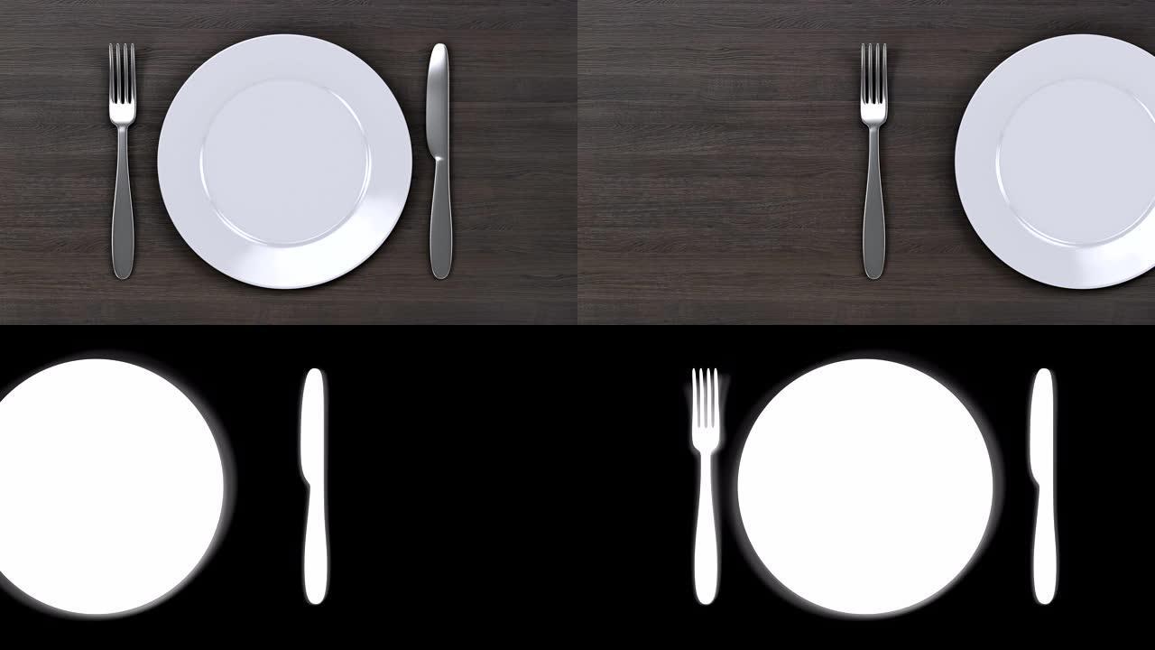空盘子。用刀叉在木桌背景上移动白色盘子。