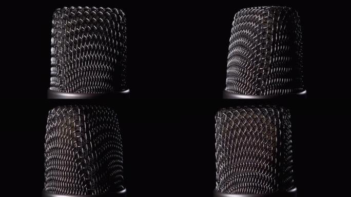 Studio Condenser Microphone Rotates on Black Backg