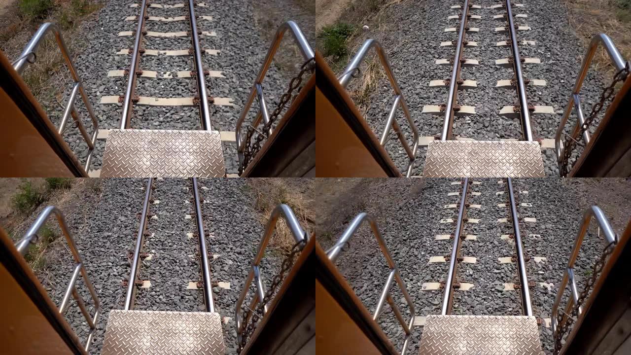 运行列车概念，后列车上的最后转向架桥楼梯在铁路上运行，泰国公共交通铁路上的快速速度