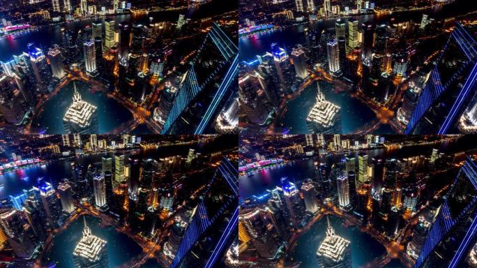 4k延时: 中国夜间上海陆家嘴区和外滩的空中全景，带照明的摩天大楼灯光秀。
