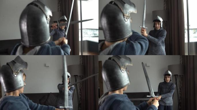 小男孩在家玩骑士打斗视频素材击剑