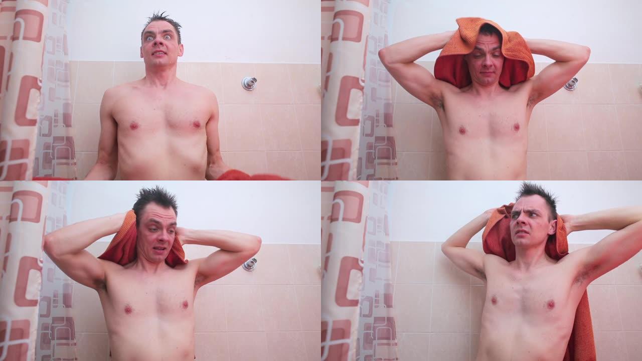 一个快乐的男人淋浴后在浴室里擦毛巾