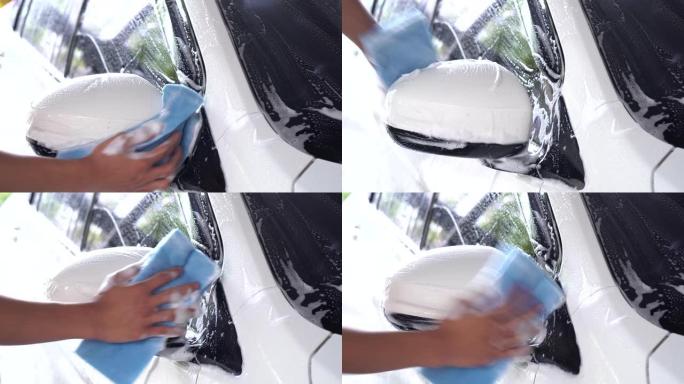 洗车，清洁车。视频素材擦汽车反光镜