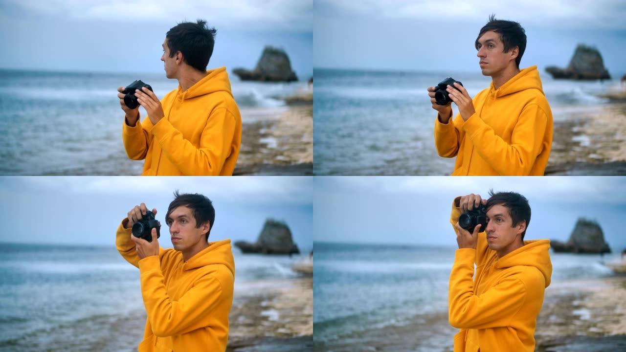 自然摄影师在美丽的热带海滩拍摄日落时的海浪。男性旅行者摄影师为博客制作专业图片。