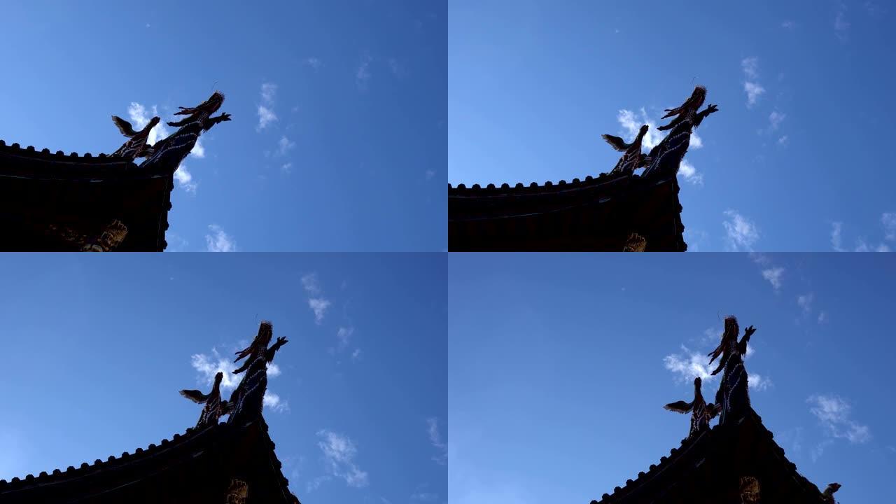 龙像的剪影。庙宇的屋顶。亚洲的石雕和古典建筑。主题在左边。